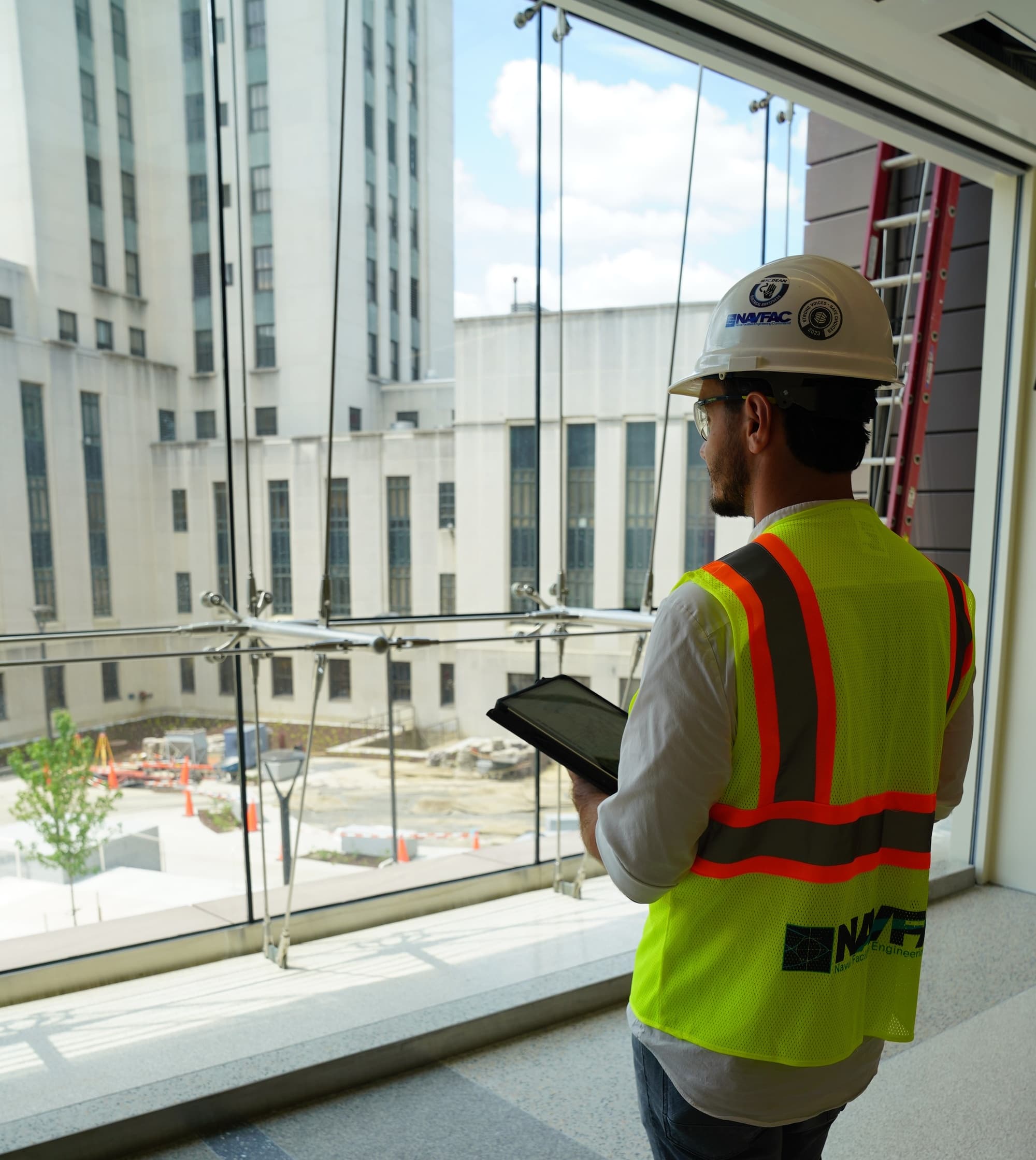 Construction site inspection for federal contract compliance monitoring and quality assurance
